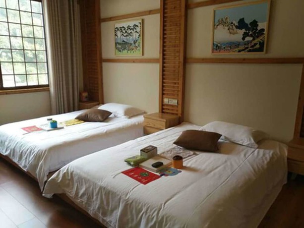 Imagen de la habitación del Hotel Qiandaohu Liyuan Village Botique Hotel. Foto 15