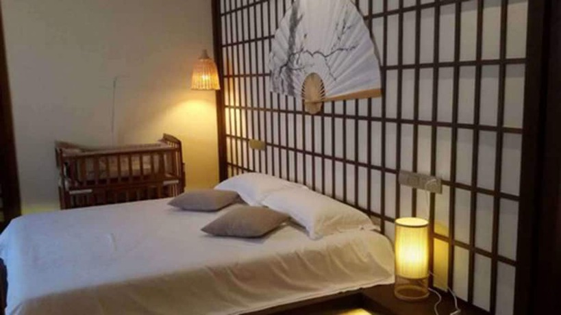 Imagen de la habitación del Hotel Qiandaohu Liyuan Village Botique Hotel. Foto 16