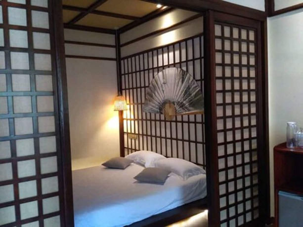 Imagen de la habitación del Hotel Qiandaohu Liyuan Village Botique Hotel. Foto 17