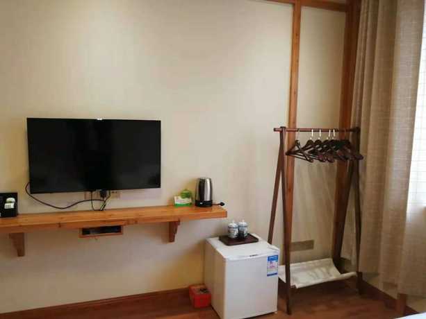 Imagen de la habitación del Hotel Qiandaohu Liyuan Village Botique Hotel. Foto 18