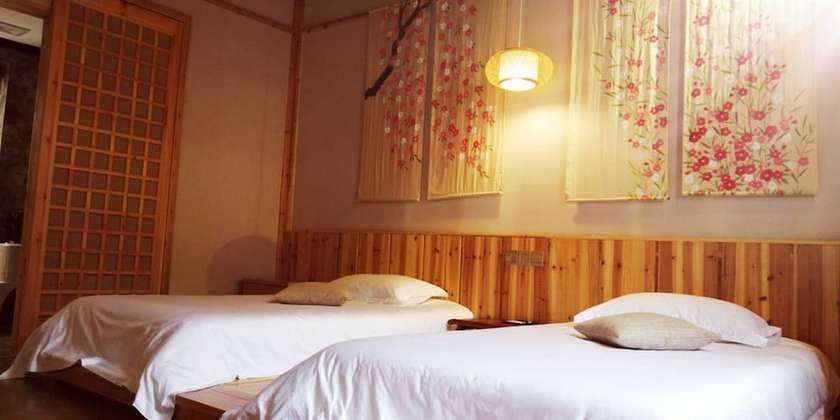 Imagen de la habitación del Hotel Qiandaohu Liyuan Village Botique Hotel. Foto 19