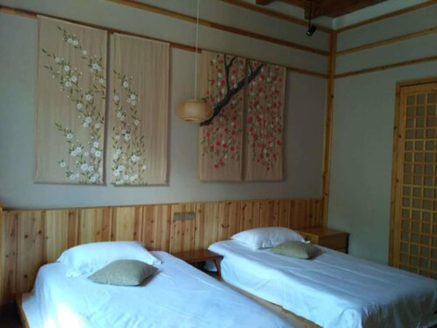 Imagen de la habitación del Hotel Qiandaohu Liyuan Village Botique Hotel. Foto 20