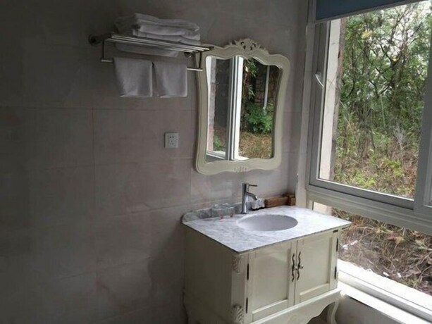 Imagen de la habitación del Hotel Qiandaohu Luxury Lake View Villa. Foto 5