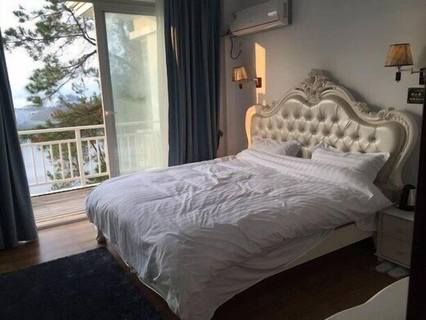 Imagen de la habitación del Hotel Qiandaohu Luxury Lake View Villa. Foto 6