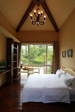 Imagen de la habitación del Hotel Qiandaohu Our Relax Villa. Foto 28