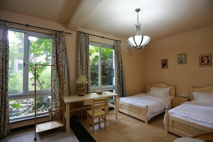 Imagen de la habitación del Hotel Qiandaohu Our Relax Villa. Foto 31