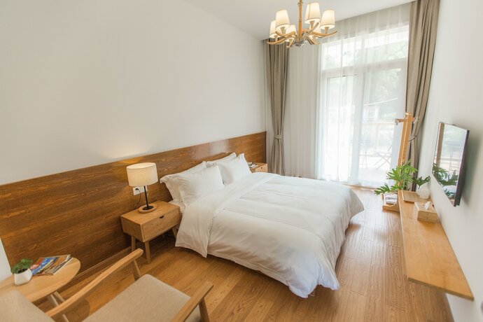 Imagen de la habitación del Hotel Qiandaohu Shishan My House. Foto 11