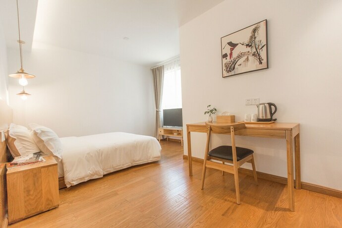 Imagen de la habitación del Hotel Qiandaohu Shishan My House. Foto 13