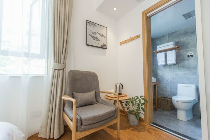 Imagen de la habitación del Hotel Qiandaohu Shishan My House. Foto 15