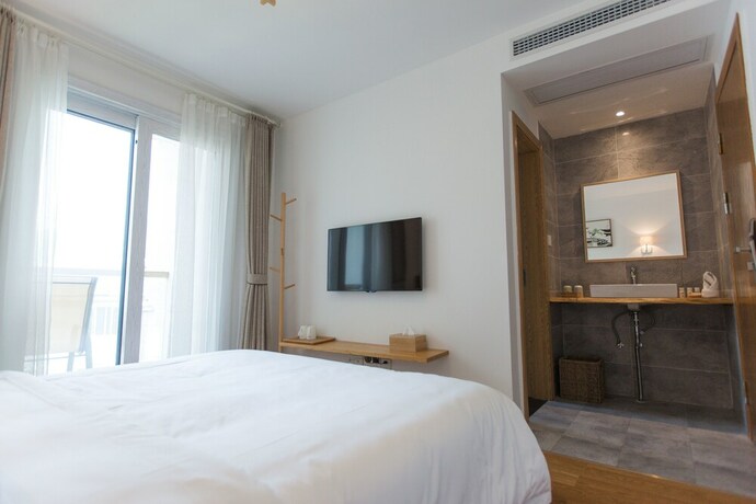 Imagen de la habitación del Hotel Qiandaohu Shishan My House. Foto 16