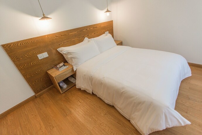 Imagen de la habitación del Hotel Qiandaohu Shishan My House. Foto 18