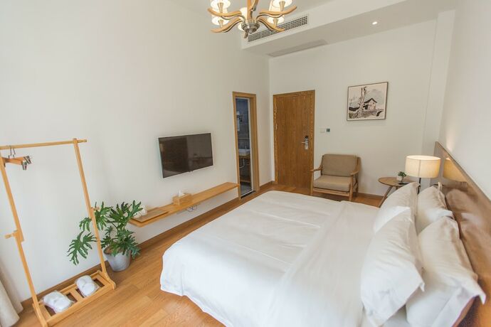 Imagen de la habitación del Hotel Qiandaohu Shishan My House. Foto 19