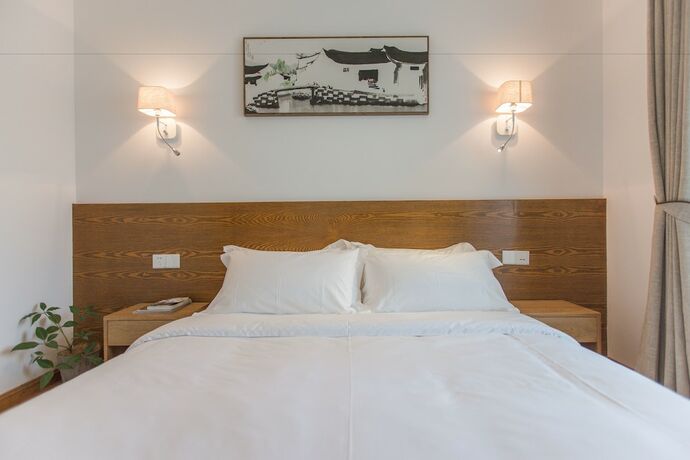 Imagen de la habitación del Hotel Qiandaohu Shishan My House. Foto 20