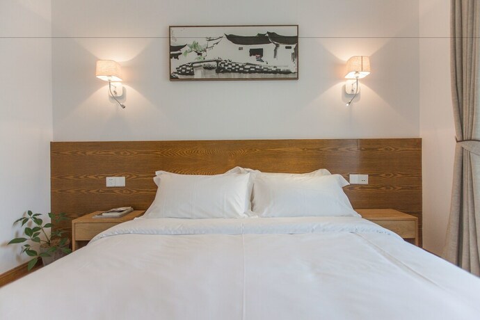 Imagen de la habitación del Hotel Qiandaohu Shishan My House. Foto 29