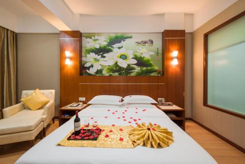 Imagen de la habitación del Hotel Qiang Wei Business. Foto 5