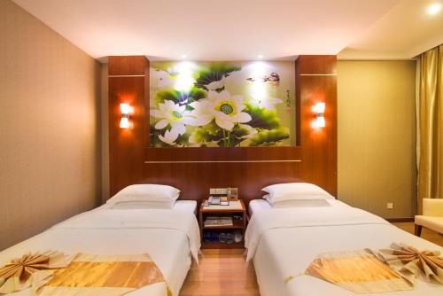 Imagen de la habitación del Hotel Qiang Wei Business. Foto 6