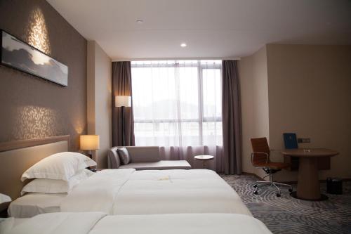 Imagen general del Hotel Qianhai Holiday. Foto 2