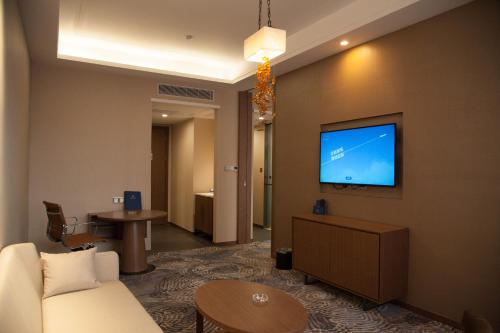 Imagen general del Hotel Qianhai Holiday. Foto 4