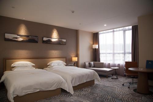 Imagen general del Hotel Qianhai Holiday. Foto 6