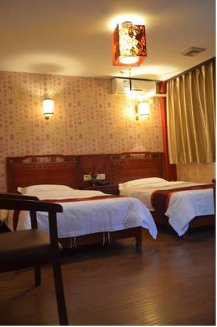 Imagen de la habitación del Hotel Qianmen Courtyard. Foto 6