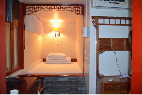 Imagen de la habitación del Hotel Qianmen Courtyard. Foto 14