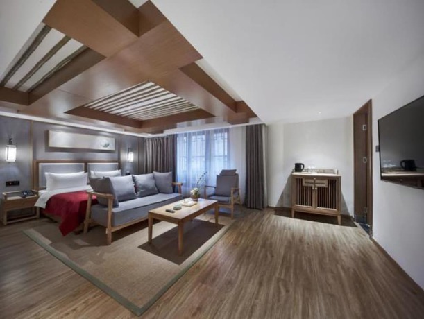 Imagen de la habitación del Hotel Qianna Bianyuan Hotel. Foto 2