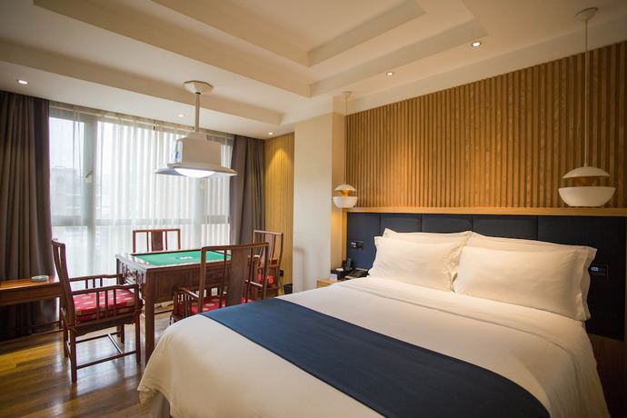 Imagen de la habitación del Hotel Qianna Chengji Hotel. Foto 3