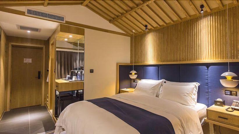 Imagen de la habitación del Hotel Qianna Chengji Hotel. Foto 6