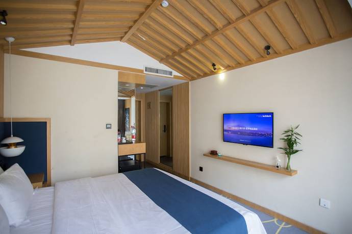 Imagen de la habitación del Hotel Qianna Chengji Hotel. Foto 9
