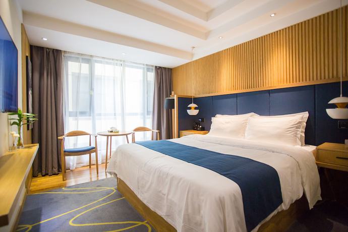 Imagen de la habitación del Hotel Qianna Chengji Hotel. Foto 16