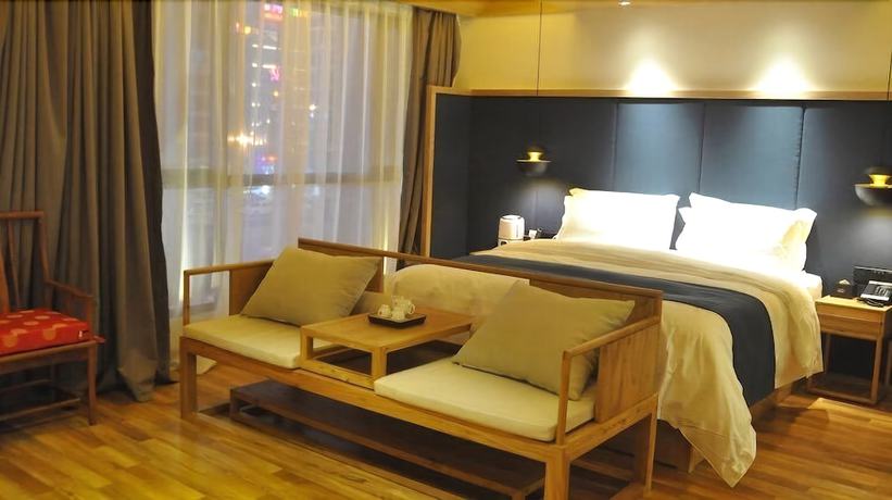 Imagen de la habitación del Hotel Qianna Chengji Hotel. Foto 17