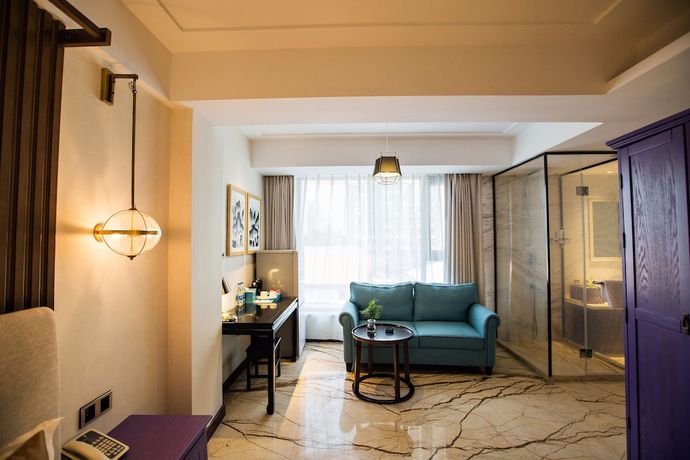 Imagen de la habitación del Hotel Qianna Lvcheng Boutique Hotel Zijingshan. Foto 7