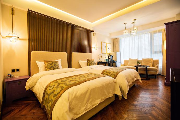 Imagen de la habitación del Hotel Qianna Lvcheng Boutique Hotel Zijingshan. Foto 9