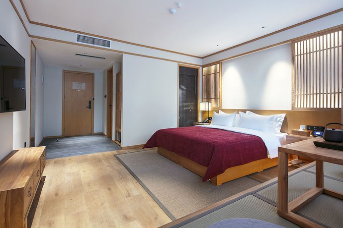 Imagen de la habitación del Hotel Qianna Yingtang Hotel. Foto 4