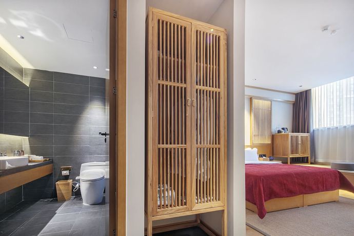 Imagen de la habitación del Hotel Qianna Yingtang Hotel. Foto 8