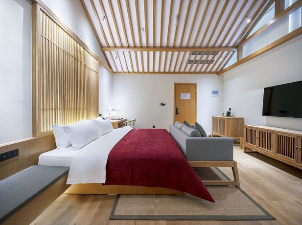 Imagen de la habitación del Hotel Qianna Yingtang Hotel. Foto 9