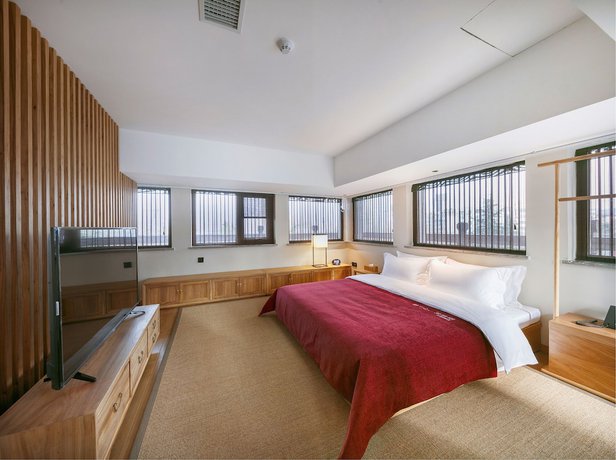 Imagen de la habitación del Hotel Qianna Yingtang Hotel. Foto 12