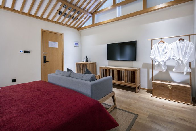 Imagen de la habitación del Hotel Qianna Yingtang Hotel. Foto 13