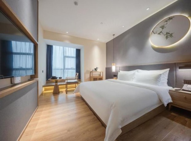 Imagen de la habitación del Hotel Qianna Zhengzhou Huayuan North Road Branch. Foto 3