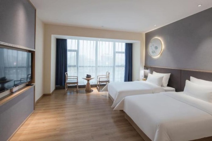 Imagen de la habitación del Hotel Qianna Zhengzhou Huayuan North Road Branch. Foto 4