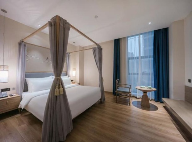 Imagen de la habitación del Hotel Qianna Zhengzhou Huayuan North Road Branch. Foto 6