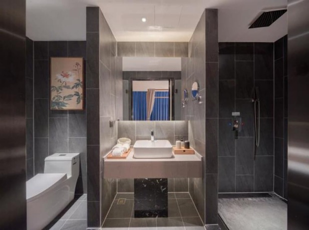 Imagen de la habitación del Hotel Qianna Zhengzhou Huayuan North Road Branch. Foto 10