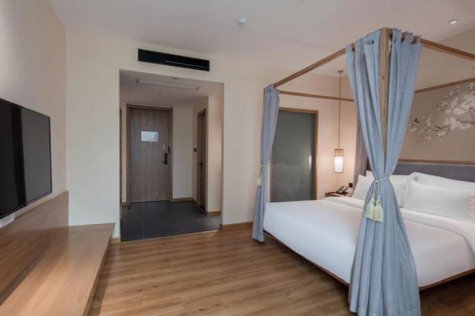 Imagen de la habitación del Hotel Qianna Zhengzhou Huayuan North Road Branch. Foto 14
