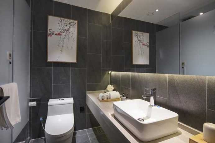 Imagen de la habitación del Hotel Qianna Zhengzhou Huayuan North Road Branch. Foto 17