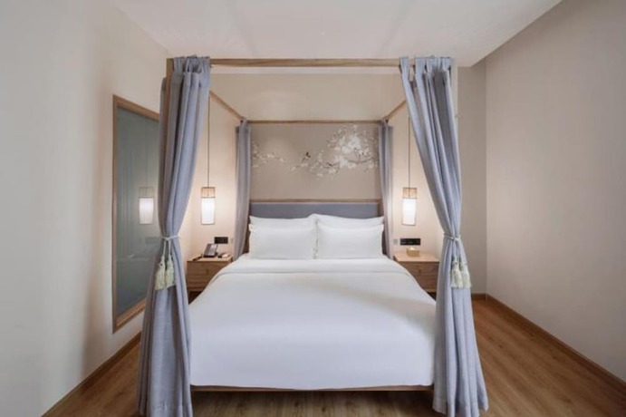 Imagen de la habitación del Hotel Qianna Zhengzhou Huayuan North Road Branch. Foto 18