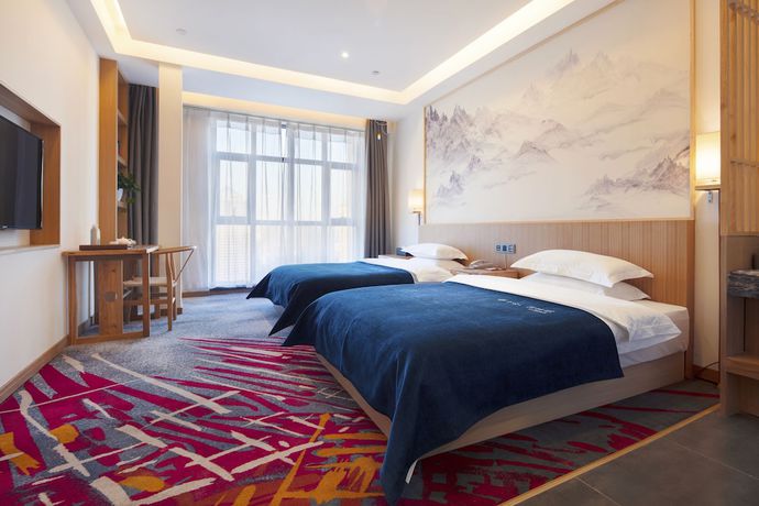 Imagen de la habitación del Hotel Qianna Zhengzhou Jingguang Road. Foto 9