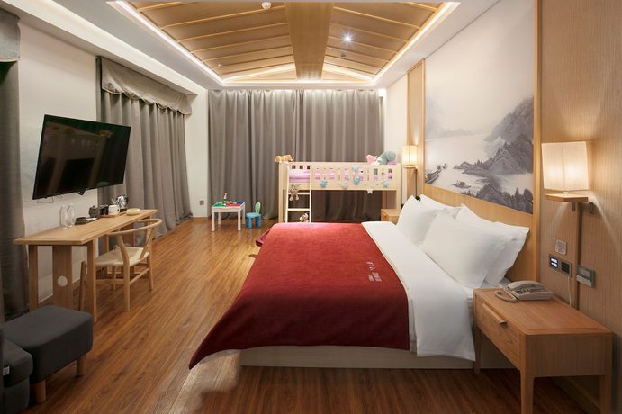 Imagen de la habitación del Hotel Qianna Zhengzhou Jingguang Road. Foto 19