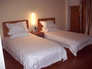 Imagen de la habitación del Hotel Qianqiao International Pudong Avenue. Foto 3