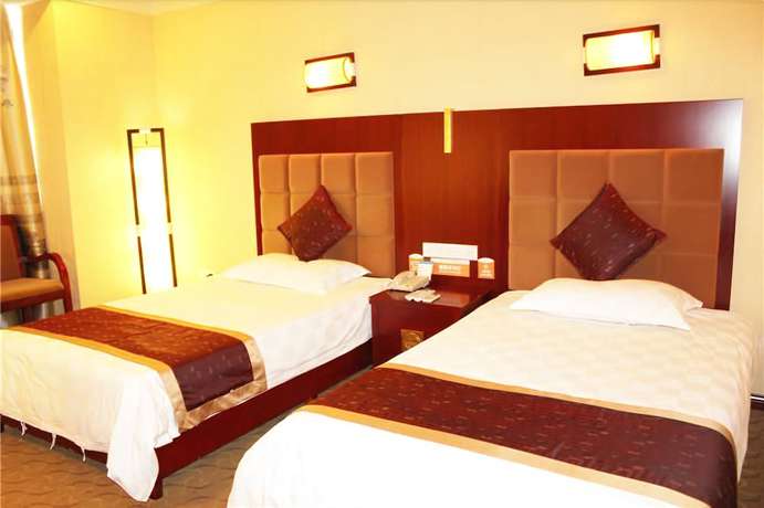 Imagen de la habitación del Hotel Qianshui Bay Hotel- Wuyuan. Foto 5