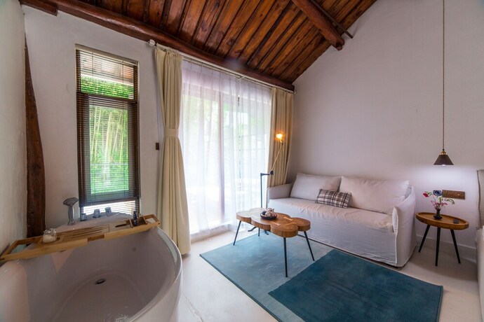 Imagen de la habitación del Hotel Qiansu Moganshan Huajianji Guesthouse. Foto 17